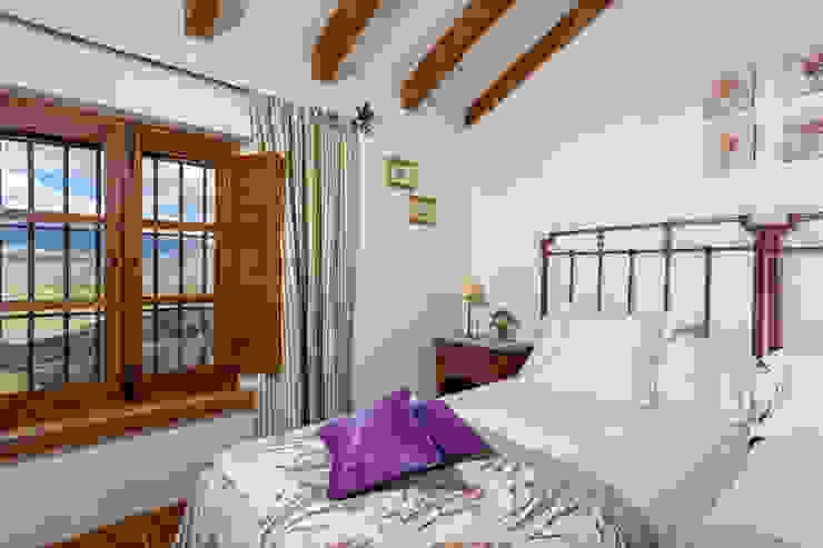 Espacios y Luz Fotografía Dormitorios rústicos