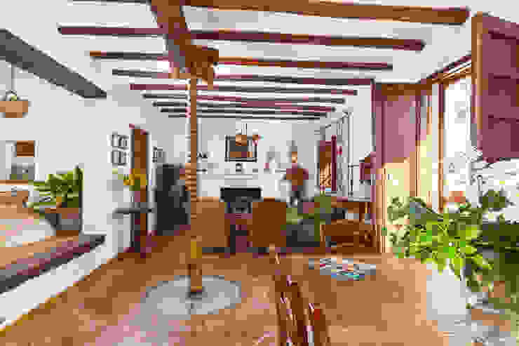 Espacios y Luz Fotografía Salones rústicos rústicos