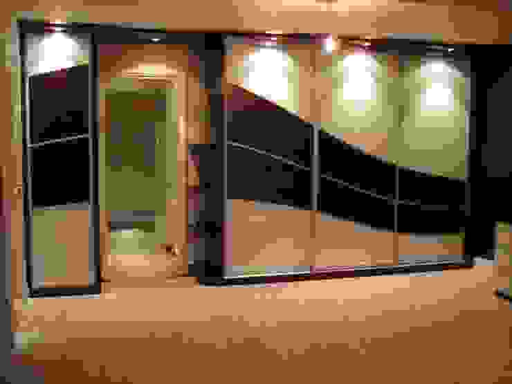 Chocolate wave sliding wardrobe doors Sliding Wardrobes World Ltd BedroomWardrobes & closets