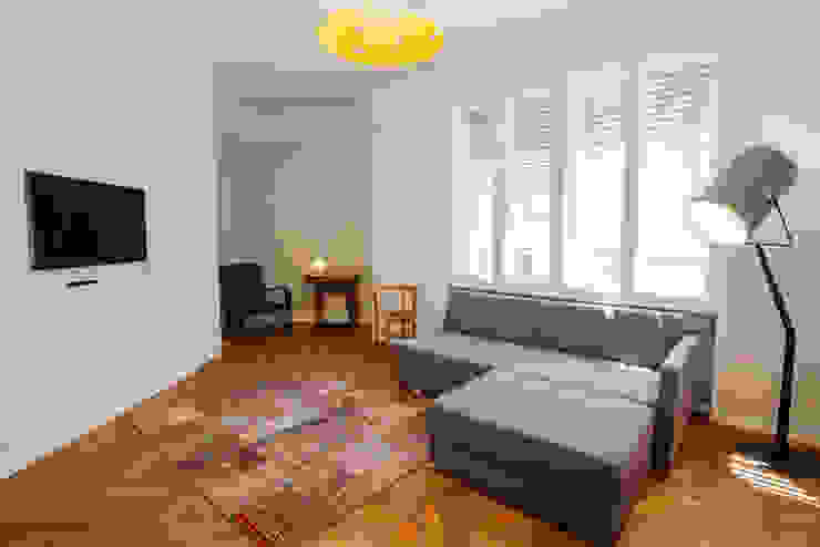 Wohnzimmer INpuls interior design & architecture Moderne Wohnzimmer