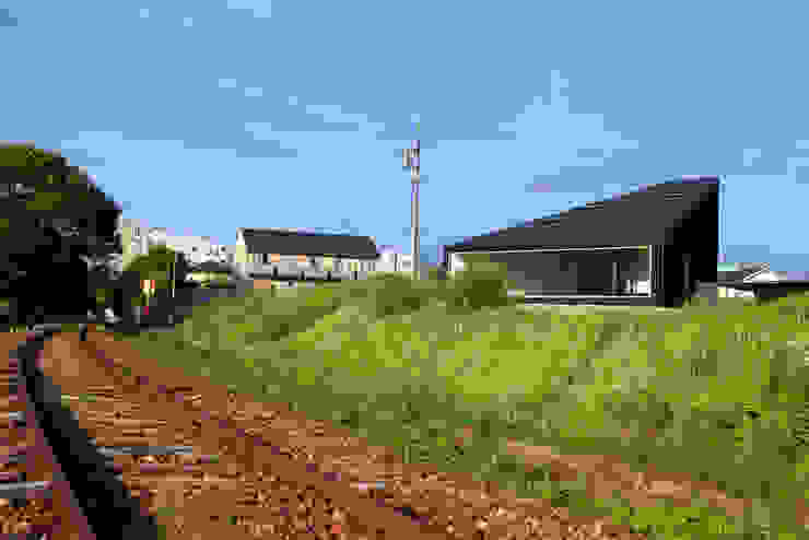 UNOU 佐々木勝敏建築設計事務所 Eclectic style houses