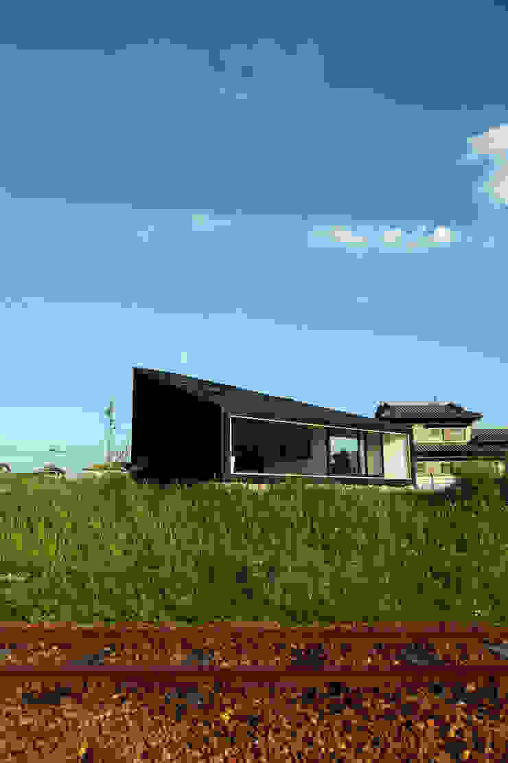 UNOU 佐々木勝敏建築設計事務所 Eclectic style houses