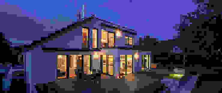 ​Ein ungewöhnlicher Umbau für zwei Familien, KitzlingerHaus GmbH & Co. KG KitzlingerHaus GmbH & Co. KG