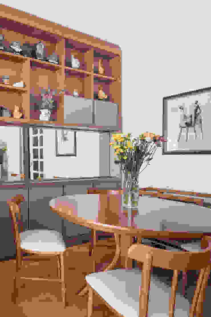 Estar Salas de estar ecléticas por Blacher Arquitetura Eclético