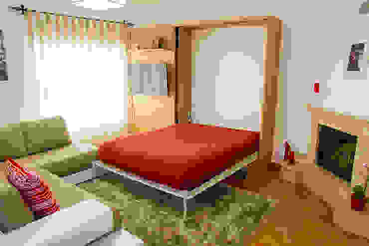 Cama oculta em móvel de sala, GenesisDecor GenesisDecor اتاق خواب تخت خواب