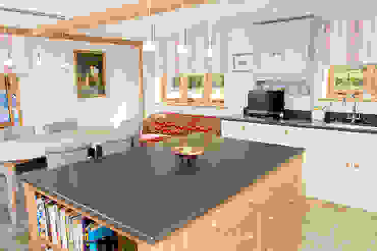 Granite kitchen island Design by Deborah Ltd Country style kitchen Cabinets & shelves