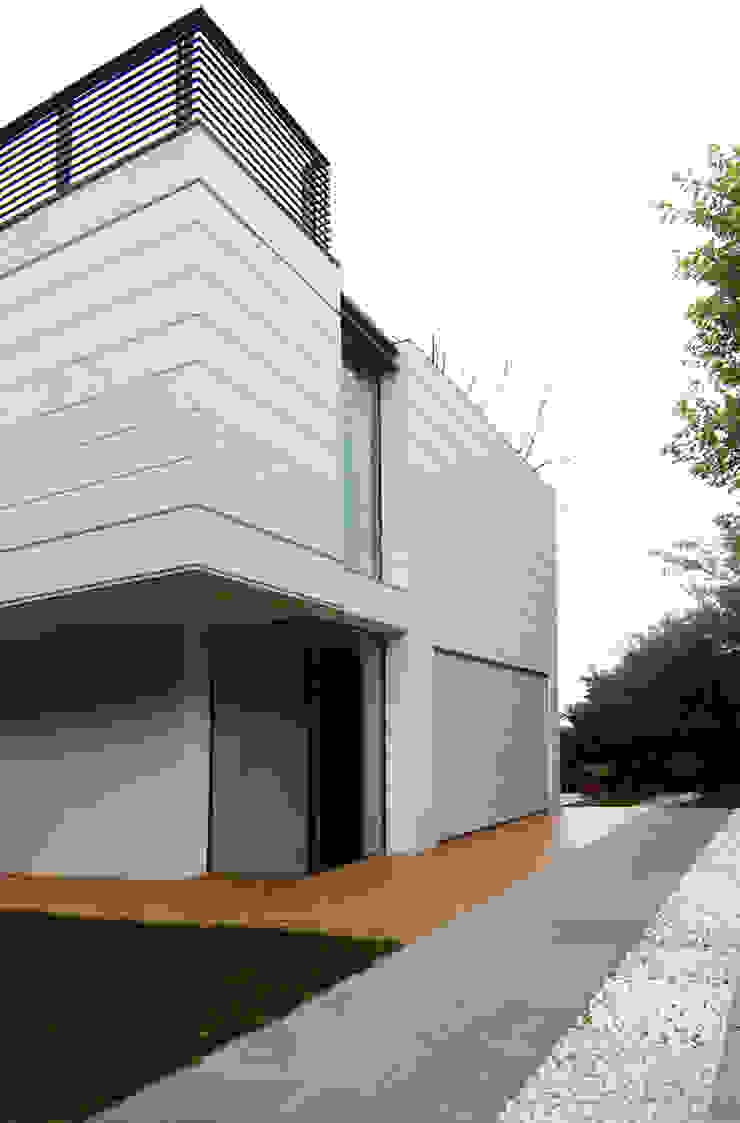 Modern garage/shed by NAT OFFICE - christian gasparini architect Modern