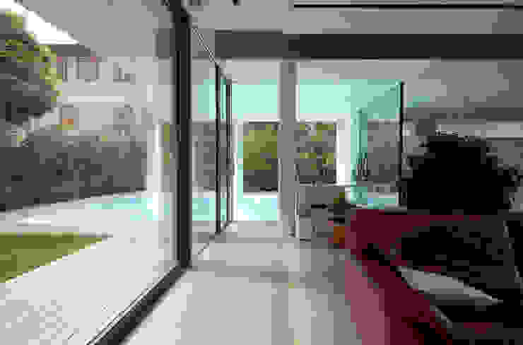 Modern living room by NAT OFFICE - christian gasparini architect Modern