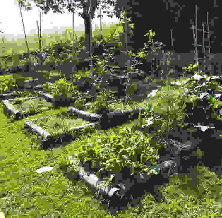 M+M Ti regalo un giardino, suingiardino suingiardino Garten im Landhausstil