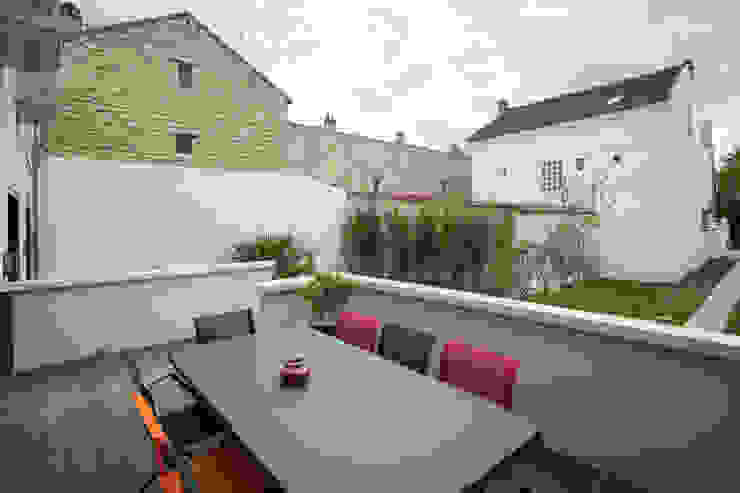 en coeur d'ilôt, agence MGA architecte DPLG agence MGA architecte DPLG Balcon, Veranda & Terrasse modernes