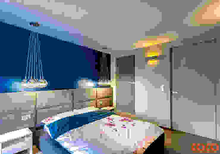 Quartos minimalistas por COCO Pracownia projektowania wnętrz Minimalista