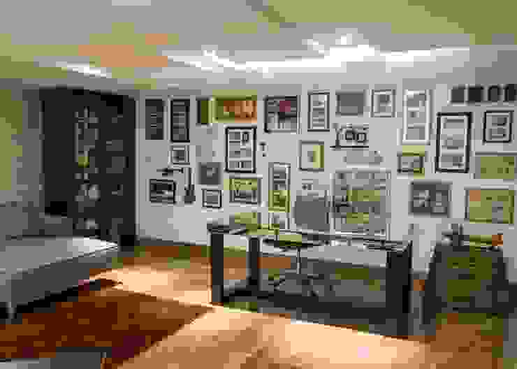 Sala de reflexão, espaço da família com vista para o Living RABAIOLI I FREITAS Escritórios modernos