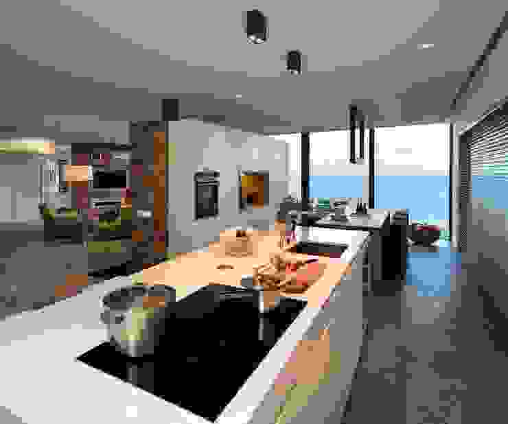 Vista general del espacio interior. Zona de cocina-comedor-estar. VelezCarrascoArquitecto VCArq Cocinas modernas