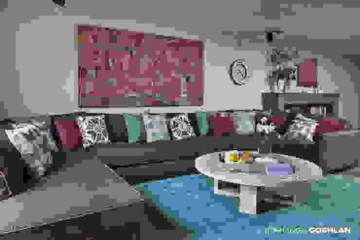 Estar familiar o family room MARIANGEL COGHLAN Salas multimedia de estilo moderno
