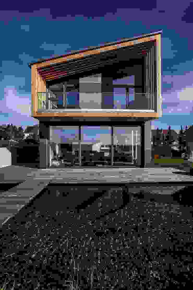 21-arch GmbH Eclectic style houses