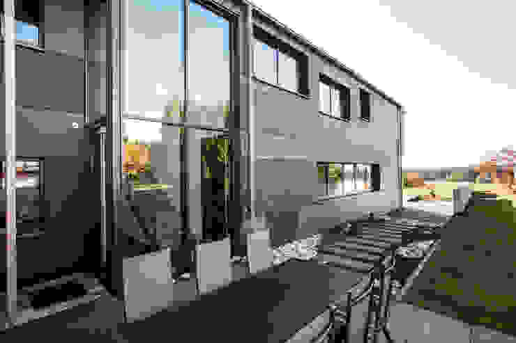 21-arch GmbH Eclectic style houses