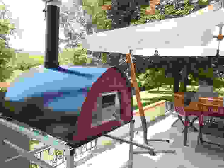 Wood burning oven Pizzone placement: Garden Genotema SRL Unipersonale Rustikaler Garten Feuerplätze und Grill