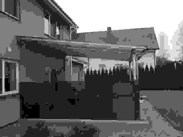 Glass Canopy with steel frame Inox City Ltd Modern balcony, veranda & terrace
