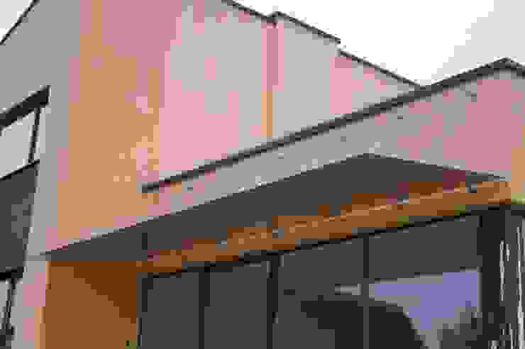 Glass Canopy with wall-suspended supports Inox City Ltd Modern balcony, veranda & terrace