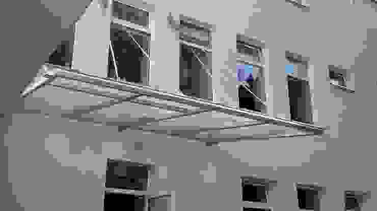 Glass Canopy with wall-suspended supports Inox City Ltd Modern schools