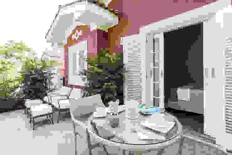 Casa Cidade Jardim Boutique Arquitetura Varandas, alpendres e terraços modernos