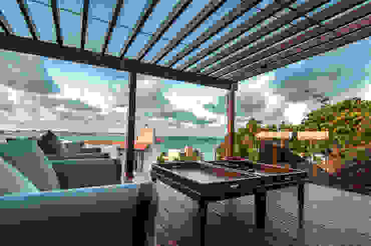 homify Tropischer Balkon, Veranda & Terrasse