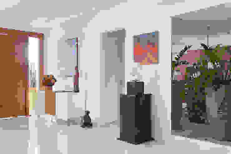 Casa Luxo Carolina Mendonça Projetos de Arquitetura e Interiores LTDA Salas de estar modernas