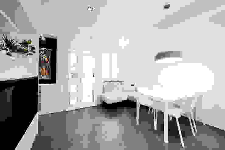 venticinque, 23bassi studio di architettura 23bassi studio di architettura Ruang Keluarga Minimalis