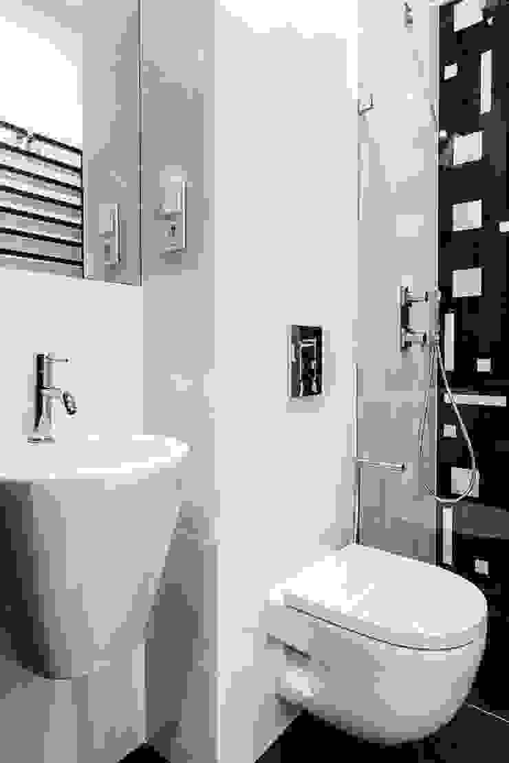 Casas de banho modernas por Anna Maria Sokołowska Architektura Wnętrz Moderno