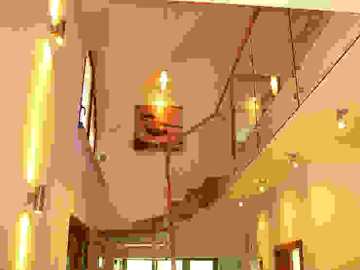 homify Modern corridor, hallway & stairs