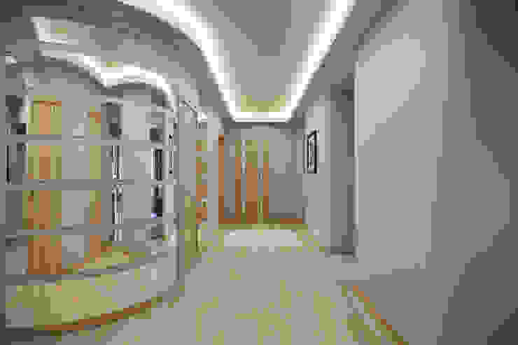 homify Modern Corridor, Hallway and Staircase Beige
