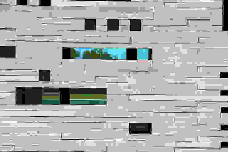 Pormenor Fachada de lajetas de betão guedes cruz arquitectos Casas minimalistas