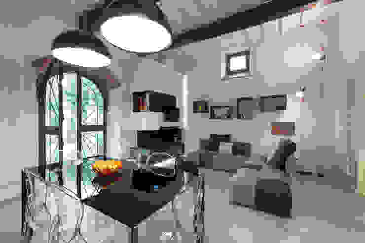 Lo scrigno dal cuore contemporaneo, B+P architetti B+P architetti Modern living room