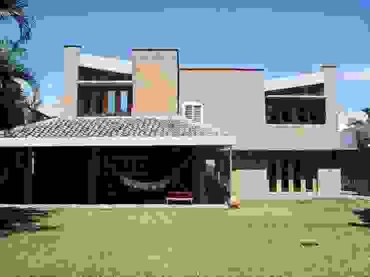 Fachada Nor-Este ya remodelada Odart Graterol Arquitecto Casas de estilo ecléctico Ladrillos Marrón