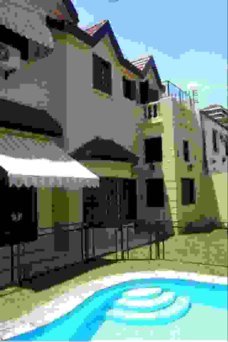 Vista patio trasero + pileta Radrizzani Rioja Arquitectos Albercas eclécticas Concreto Amarillo