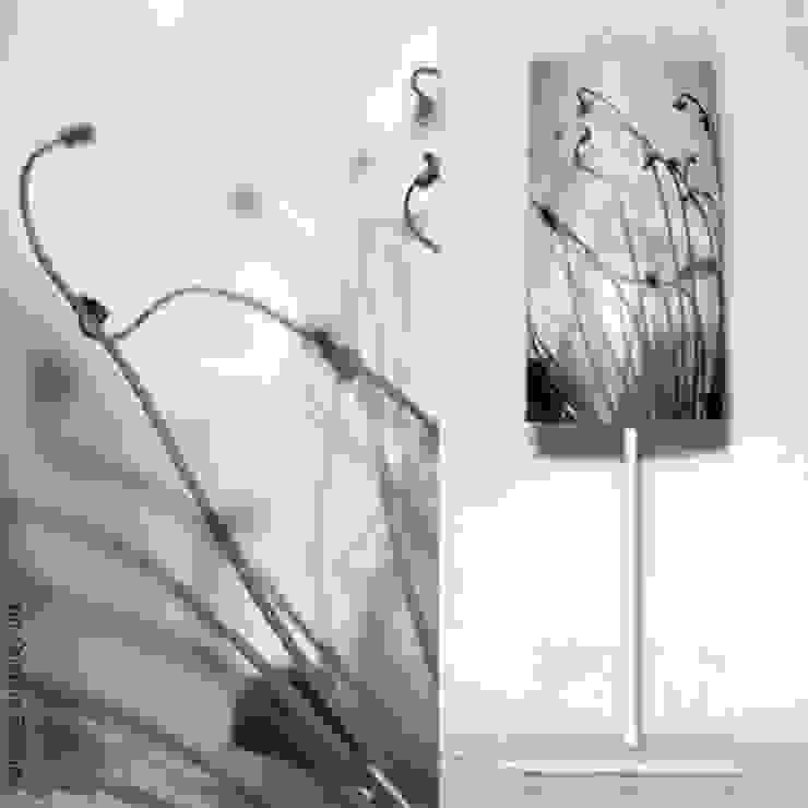 Realizzazioni Salas de estar modernas por Isola. Fotografia e Design Moderno