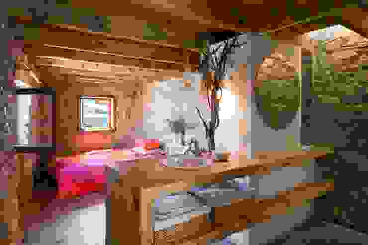 Rustic style bedroom by pedro quintela studio Rustic Stone