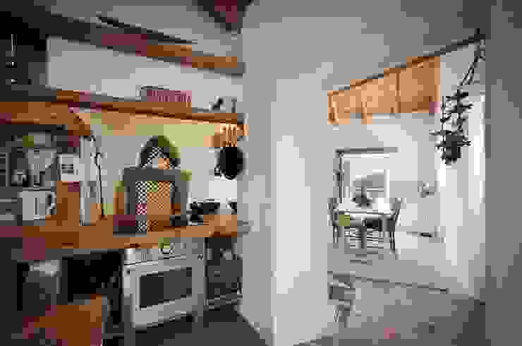 Rustic style dining room by pedro quintela studio Rustic Stone