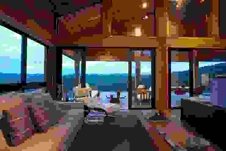 Mountain House David Guerra Arquitetura e Interiores Casas de estilo rústico