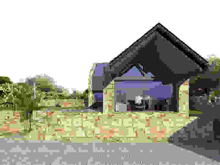 Davide Domingues Arquitecto Case in stile rustico Granito Metallizzato/Argento
