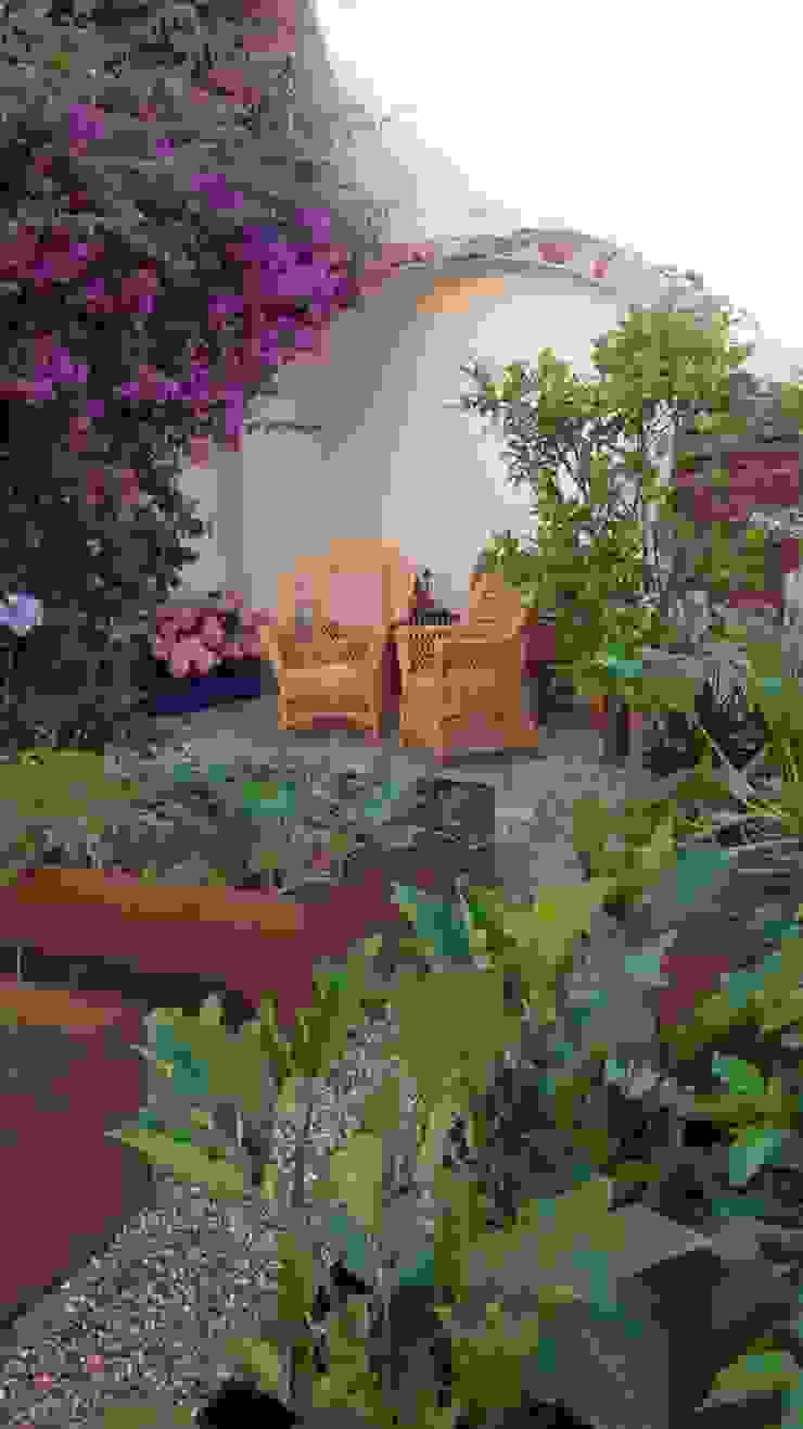 Huerto en el jardín homify Jardines de estilo ecléctico