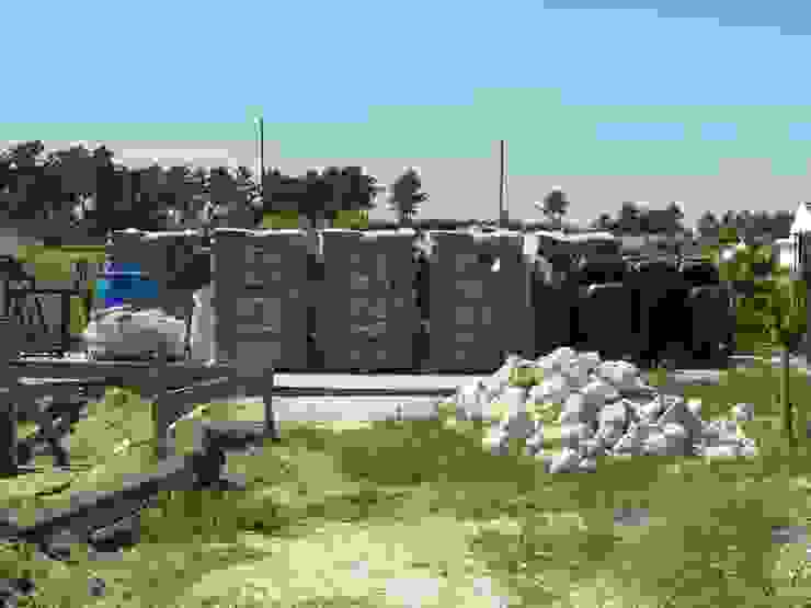 Organização de Estaleiro. Casas campestres por knowhowtobuild Campestre