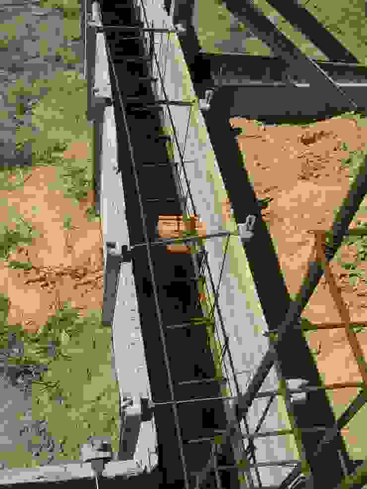 Apontamento de viga de fundação. Casas campestres por knowhowtobuild Campestre