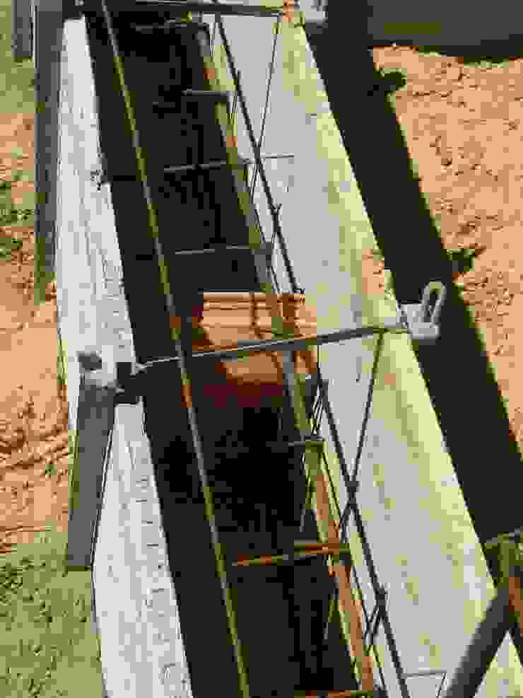 Apontamento de viga de fundação. Casas campestres por knowhowtobuild Campestre