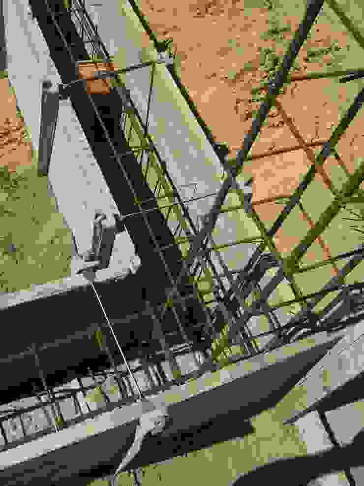 Apontamento de viga de fundação. Casas campestres por knowhowtobuild Campestre