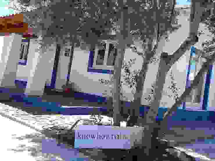 Decoração Mural Exterior. Casas campestres por knowhowtobuild Campestre