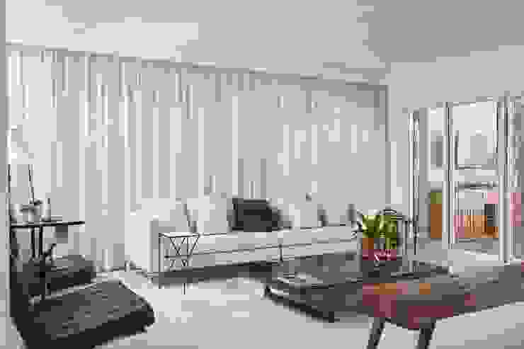 Living Salas de estar modernas por Piloni Arquitetura Moderno