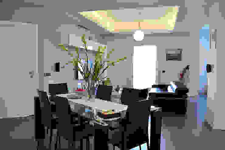Casa M, tizianavitielloarchitetto tizianavitielloarchitetto Modern dining room