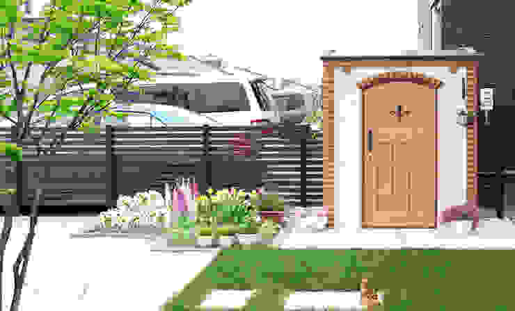 カンナキュートと仔猫のお庭, 株式会社エクスリーフ 株式会社エクスリーフ Country style gardens Bricks Wood effect Plants & flowers