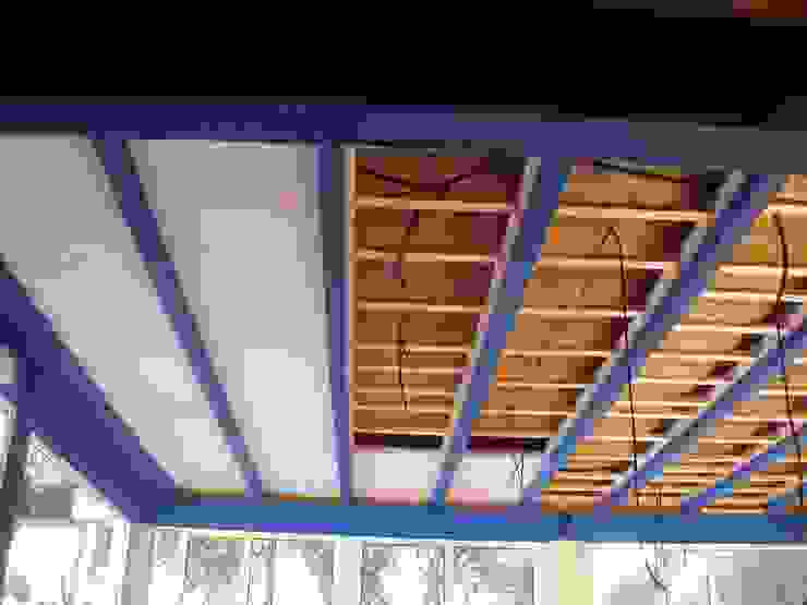 Remodelação / Renovação de Interiores Salas de estar rústicas por RenoBuild Algarve Rústico